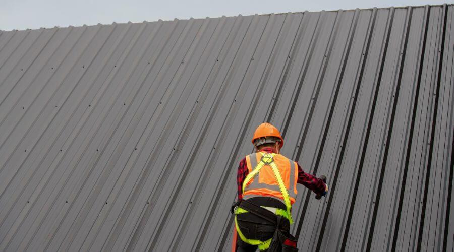 Professional metal roof installation services in Prairie City, IA